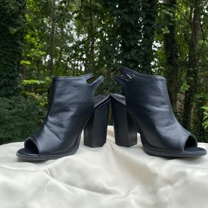 Black leather “Bella Marie” peep-toe booties, size 7